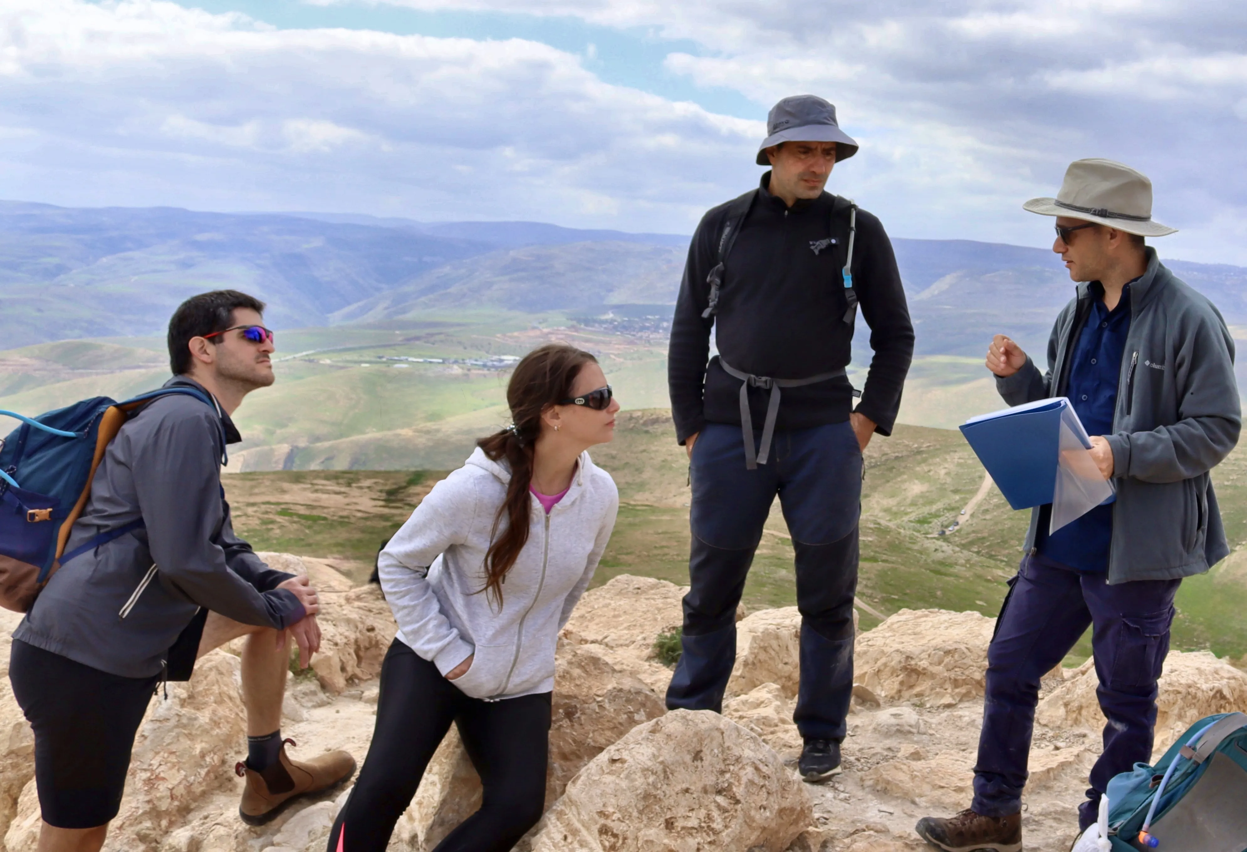 Ran Frenkel, private Israel tour guide, explaining to a small group at Sartaba, the Hasmonean fortress of Alexandrium, overlooking the Jordan Valley