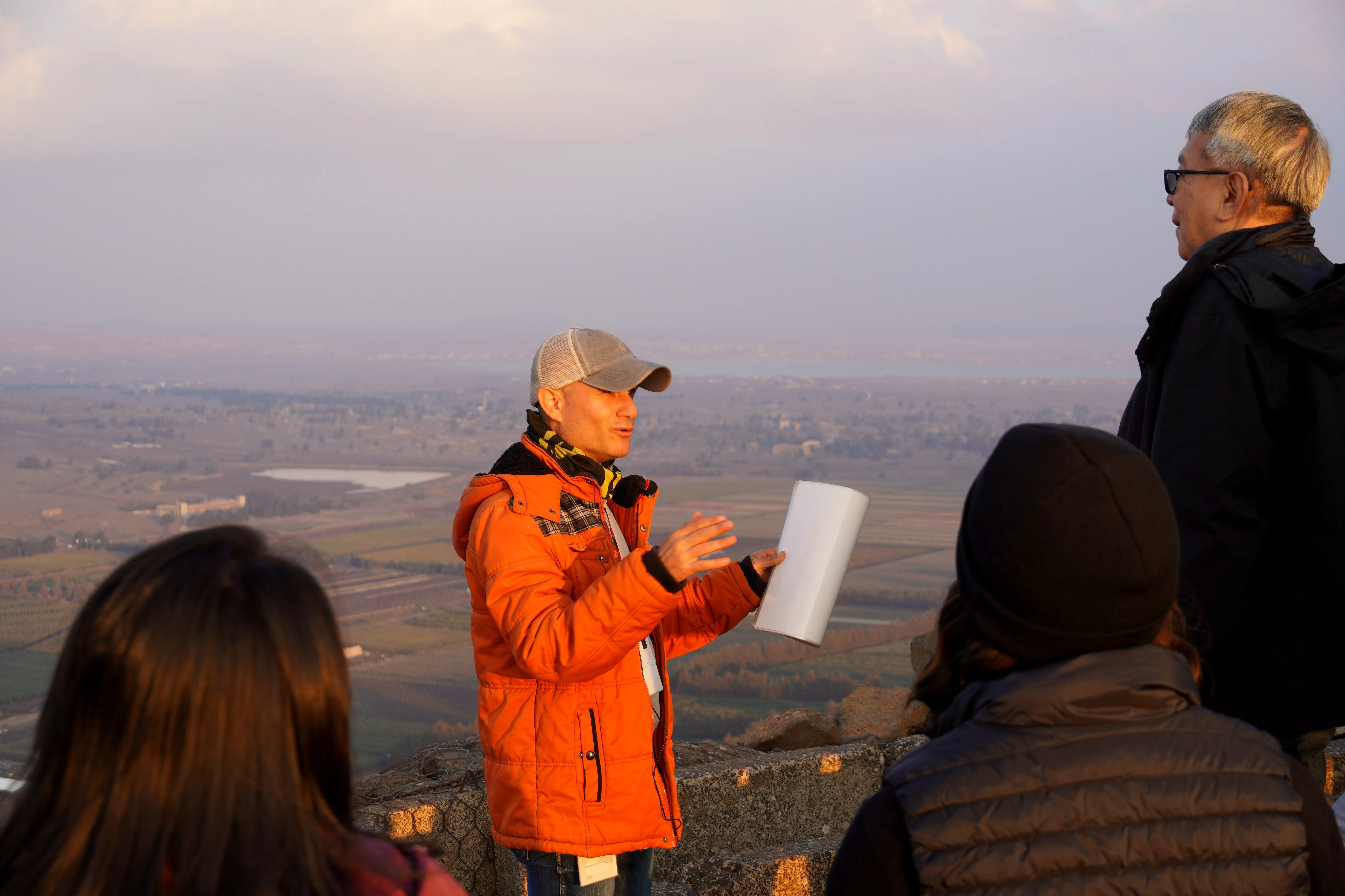 Ran Frenkel explaining the geopolitics of the region to a private tour group at the Mount Bental lookout over the valley below