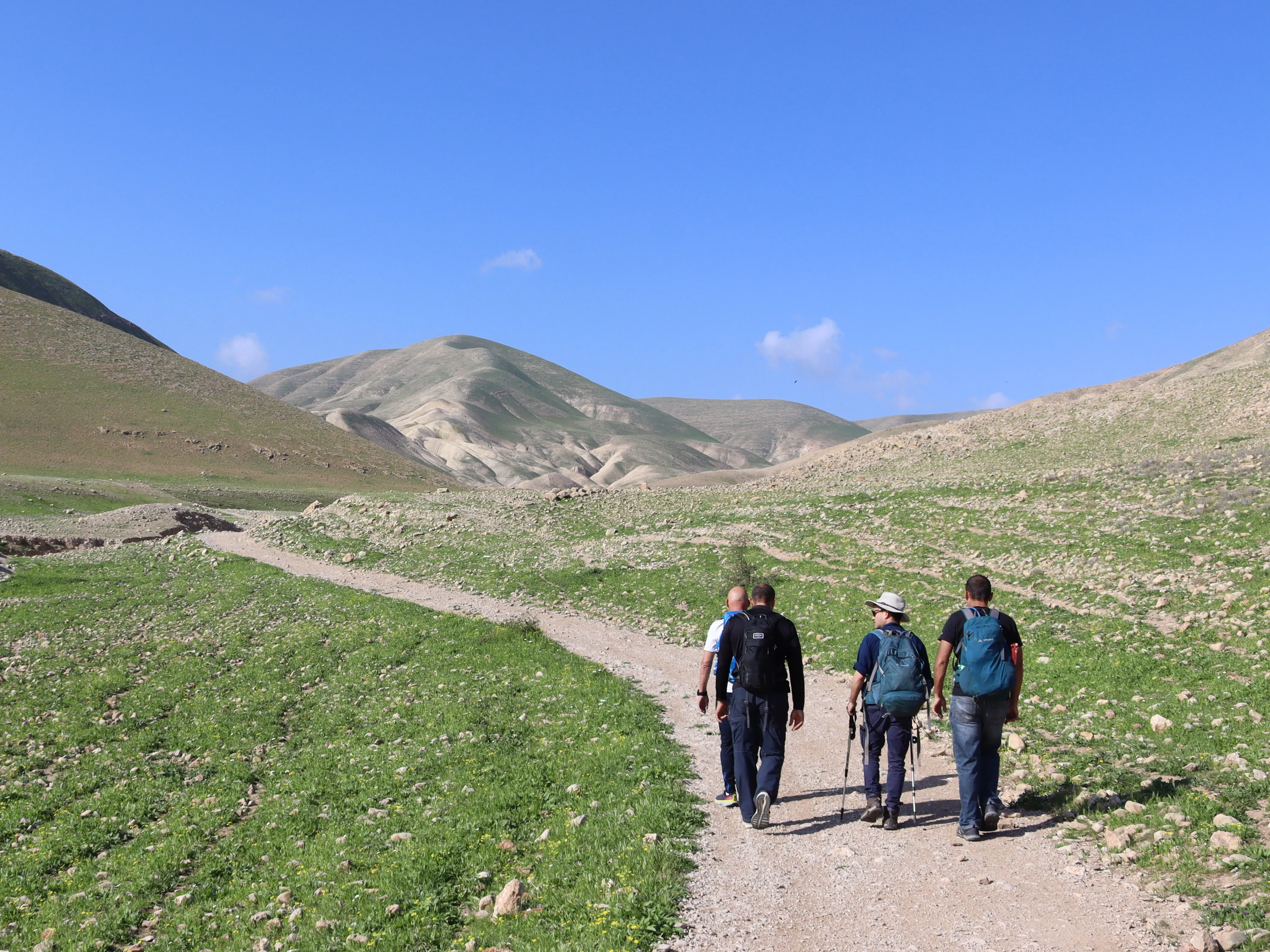 A small private group hiking up to the Alexandrium (Sartaba) fortress above the Jordan Valley